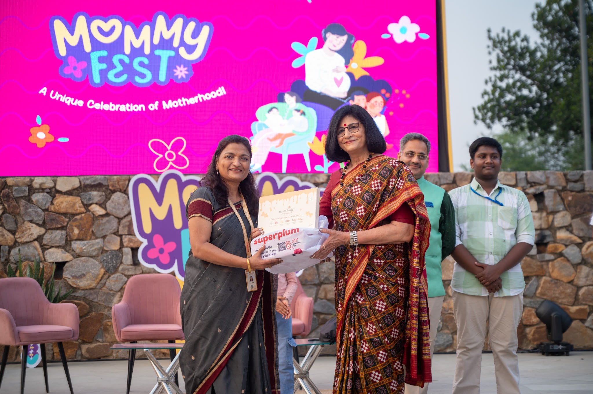 A hamper award being presented on the MommyFest stage